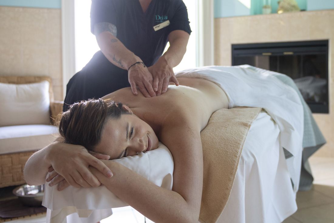 A guest relaxing during a massage at the Fox Harb'r spa