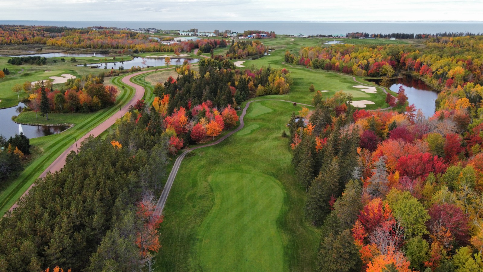 Fox Harb'r Resort — the new 18-hole course in peak fall colour, Northumberland Strait beyond