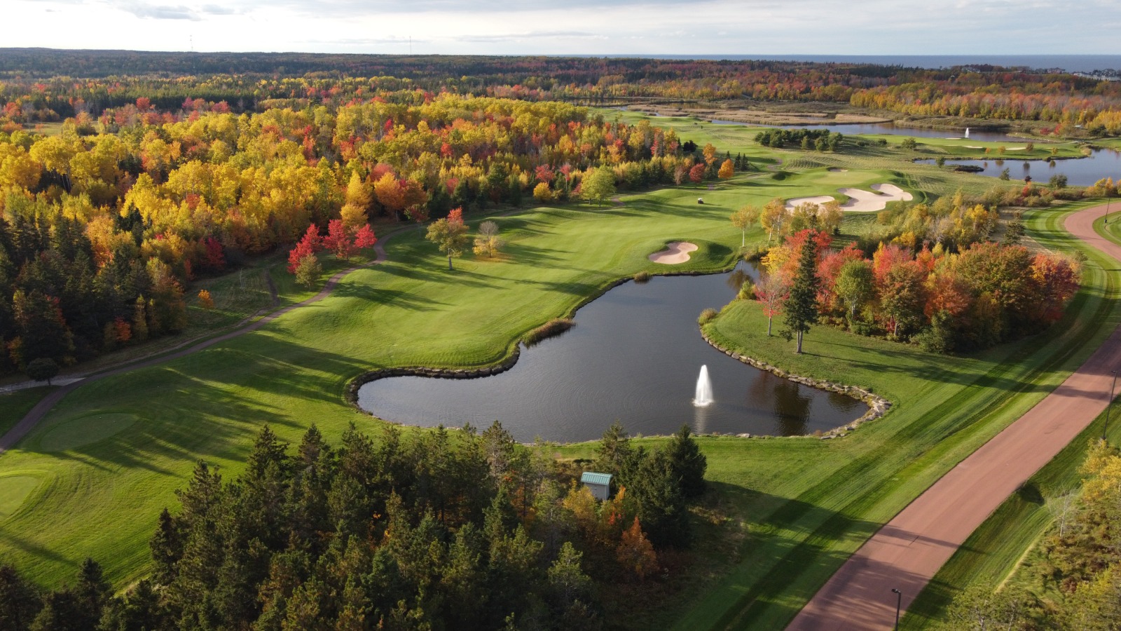 Fox Harb'r Resort — the new 18-hole course, pond and fairway in peak fall colour
